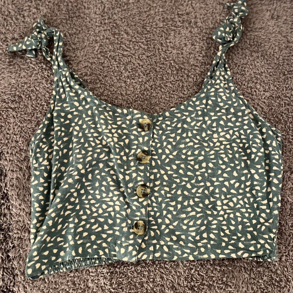 Rip curl crop top with shoulder ties very cute size tag large fits closer to a s